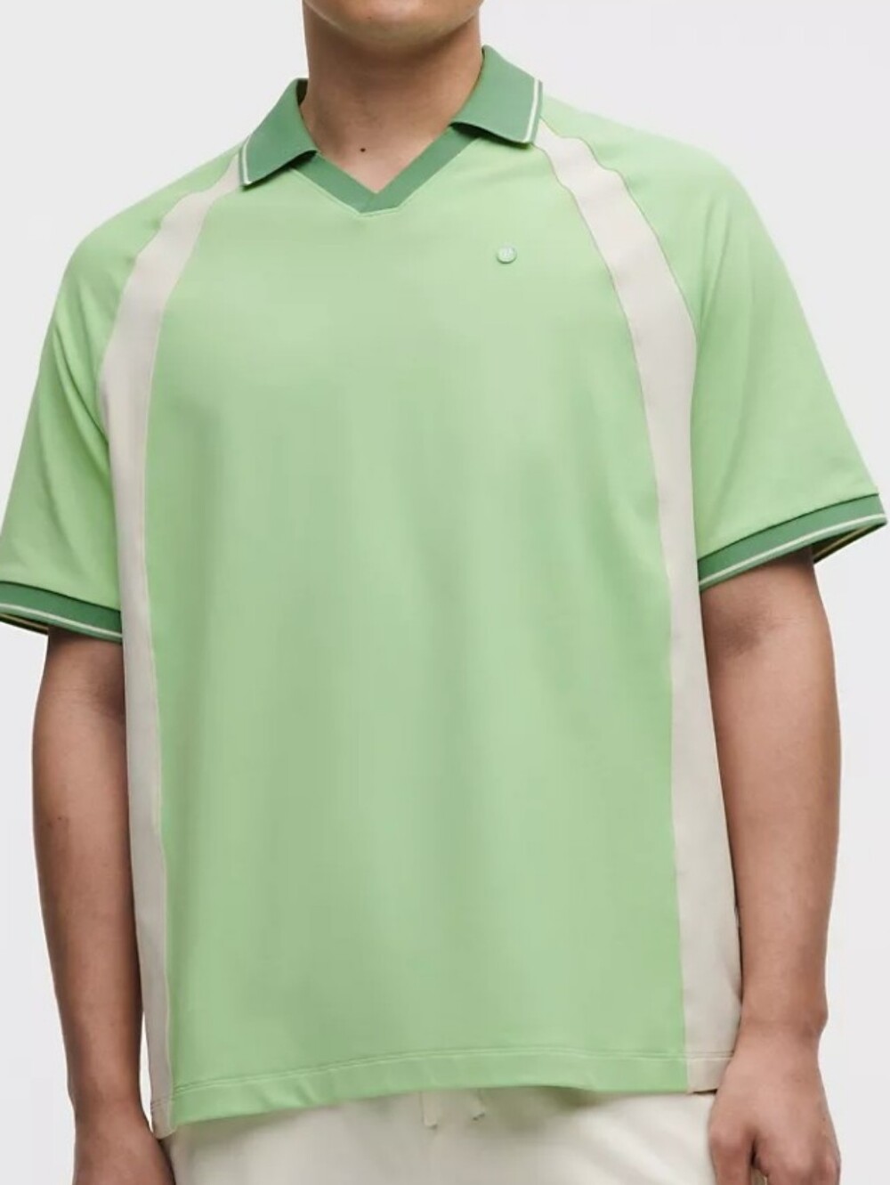 Lululemo Men's Light Relaxed Green Polo Performance Shirt with White Panels.
